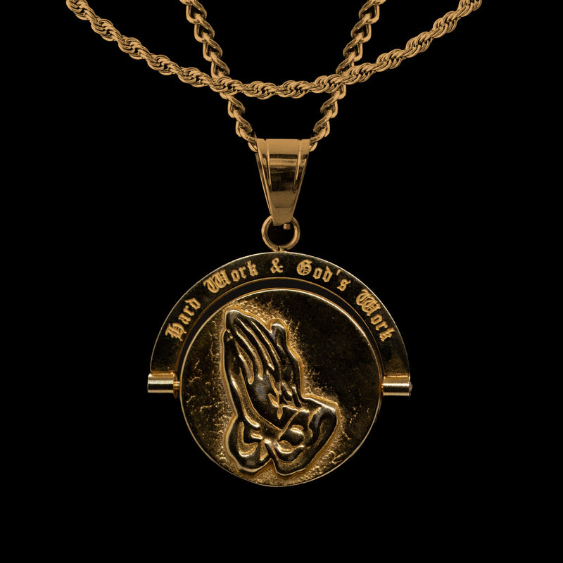 Gold 'Hard Work And God's Work' coin pendant by Humbler, inspired by ancient art.
